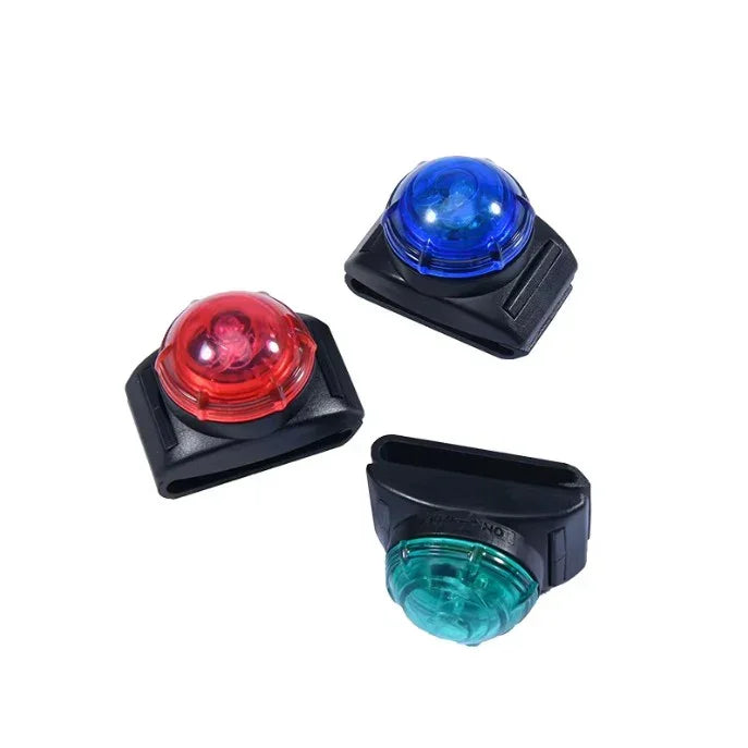 Three small LED lights in red, blue, and green on a white background