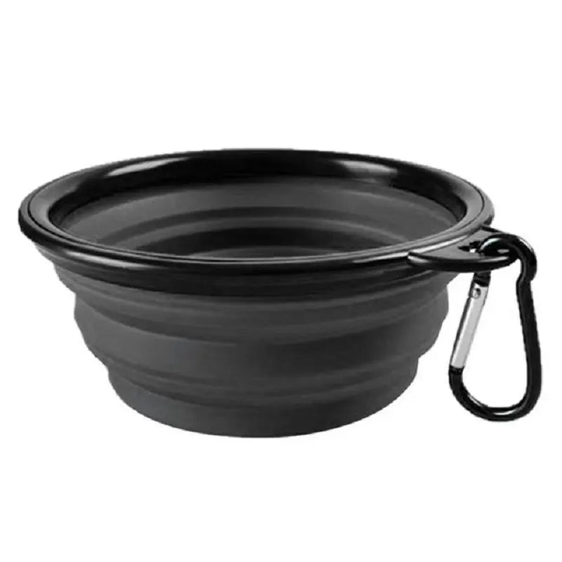 Black collapsible pet bowl with a carabiner on a white background