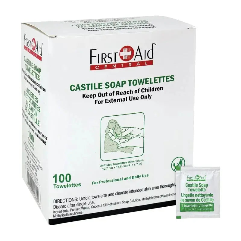 Box of First Aid Central Castile Soap Towelettes with a sample packet on a white background