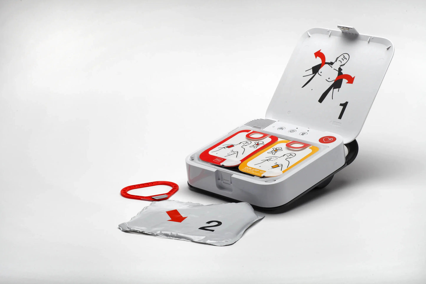 LIFEPAK CR2 AED open showing Quick-Step adult and child electrode pads inside the unit.