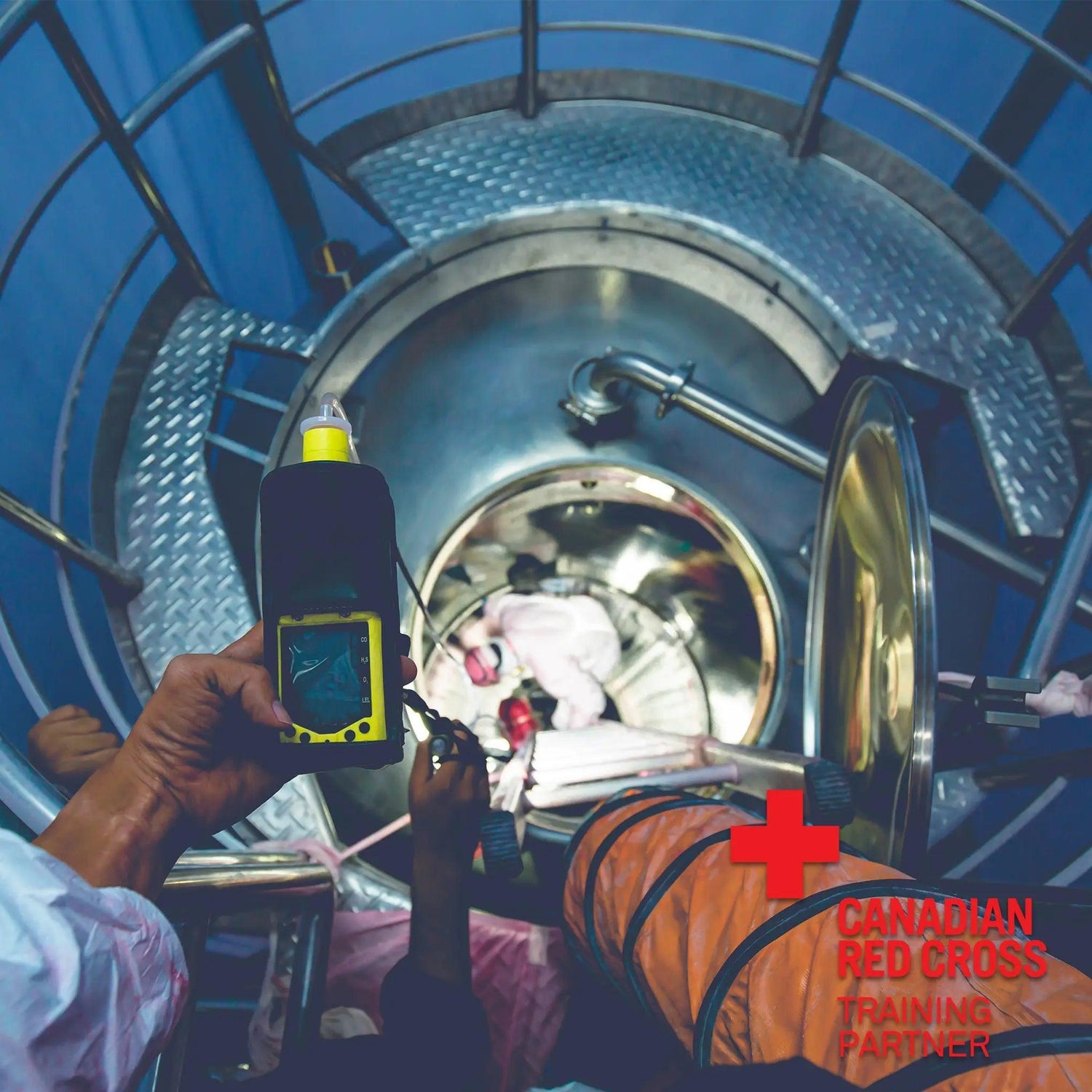 A person holding a device for H2S detection.