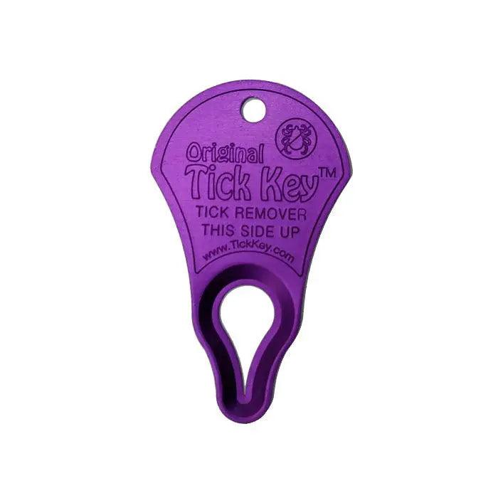 Purple tick key for easy tick removal, featuring a clear "Tick Key" label on a white backdrop.