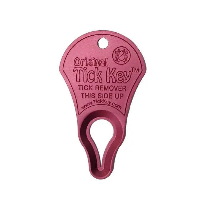 Magenta tick key for easy tick removal, featuring a clear "Tick Key" label on a white backdrop.