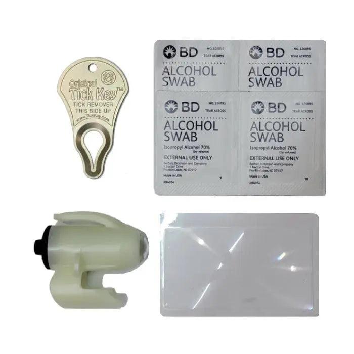 Image collage of Original Tick Key Wearable, durable, waterproof, phosphorescent, LED flashlight Magnifying glass 4 alcohol swabs (70% isopropyl alcohol, individually wrapped)
