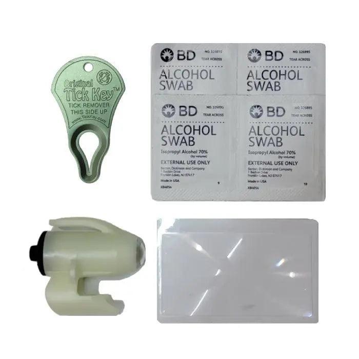 Image collage of Original Tick Key Wearable, durable, waterproof, phosphorescent, LED flashlight Magnifying glass 4 alcohol swabs (70% isopropyl alcohol, individually wrapped)