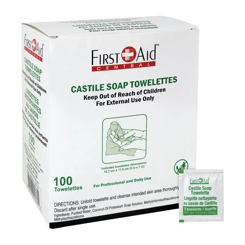 Box of First Aid Central Castile Soap Towelettes with a sample packet on a white background