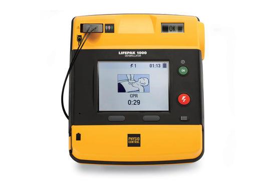 LIFEPAK 1000 automated external defibrillator powered on, front view showing CPR guidance screen.