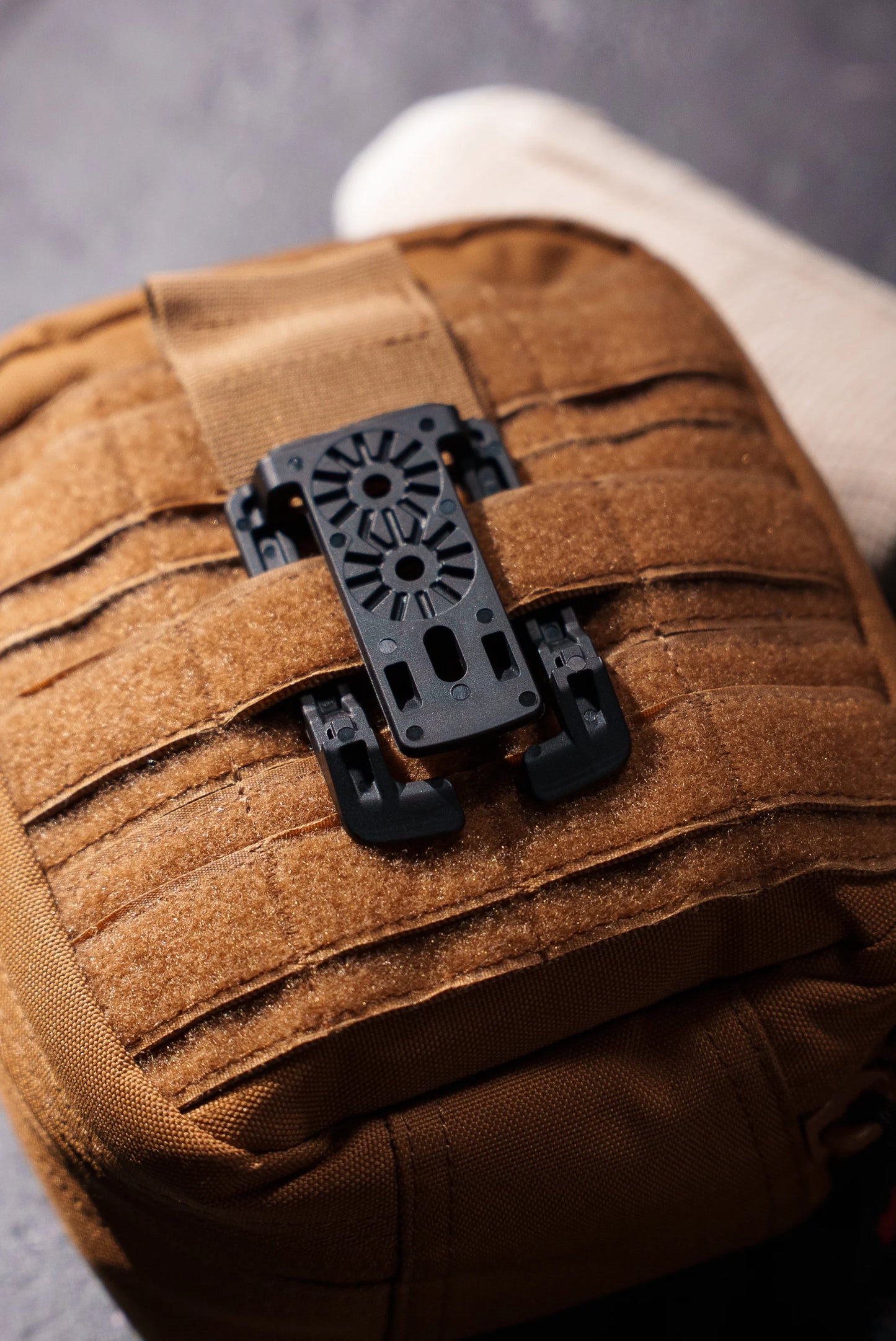 Close-up of XShear 1.5" MOLLE belt clip for holsters and accessories